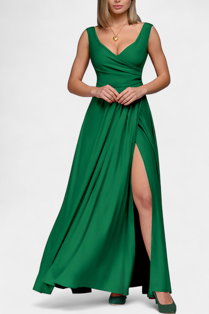 Model posing casually in a black Lila Draped Maxi Dress, capturing its versatile and comfortable style.