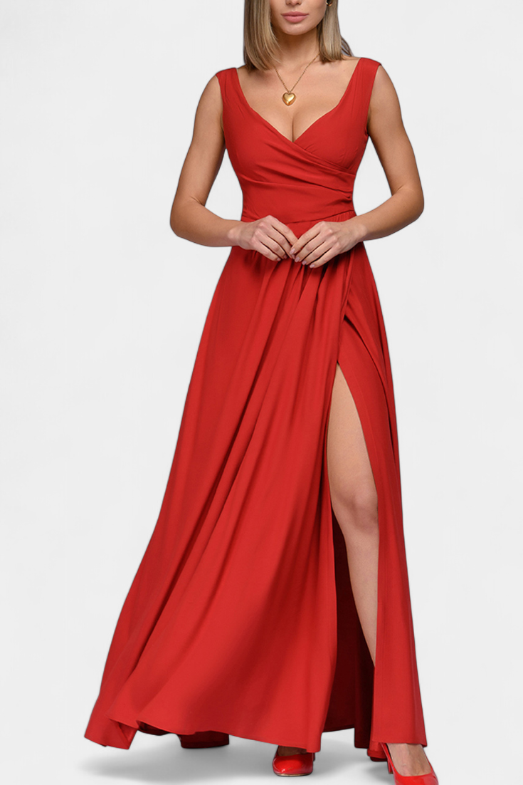 Detailed shot of the fitted waist on the green elegant draped maxi dress, enhancing the body's natural curves.