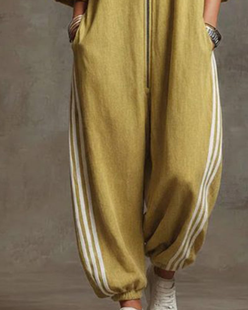 Close-up of the fabric texture and quality of the yellow Lotte Women's Jumpsuit material.