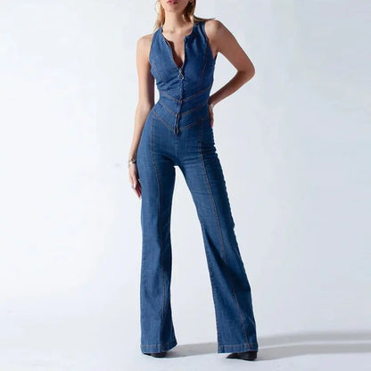 Front view of a woman wearing a stylish retro denim jumpsuit with a heart-shaped cutout on the back, showcasing its unique design.