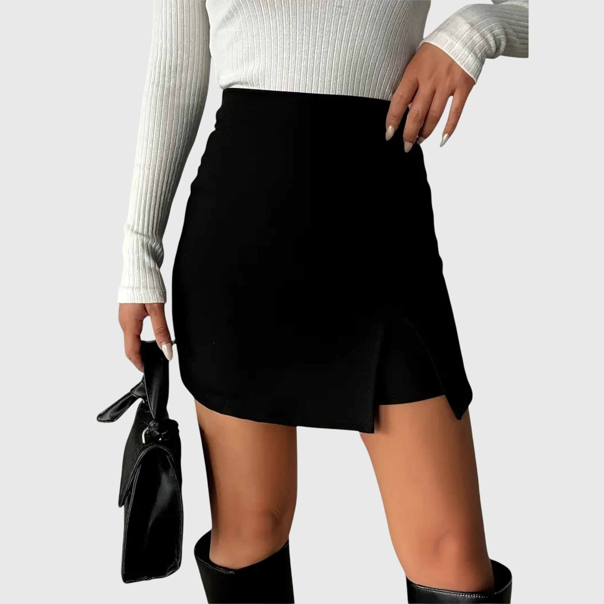 Close-up detail of the soft, slightly stretchy fabric texture on the black structured mini skirt, highlighting its quality.