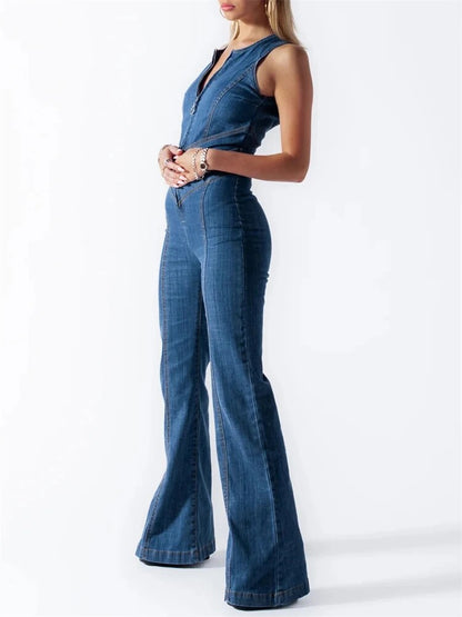 Side profile of a woman posing in the comfortable retro denim jumpsuit, emphasizing its flattering silhouette and relaxed fit.