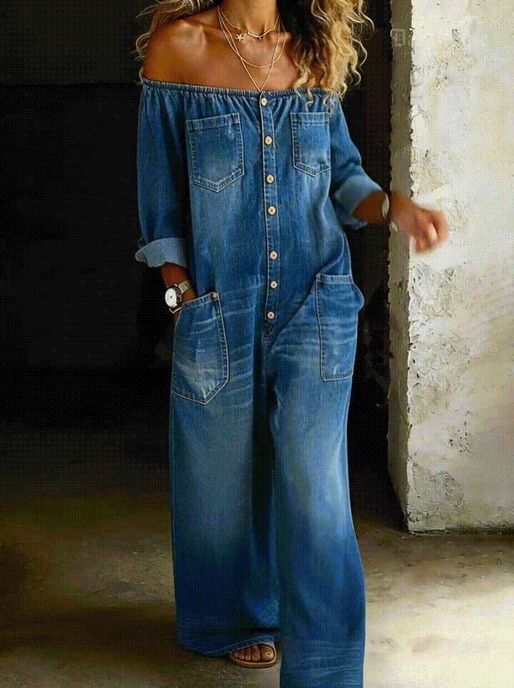 Back view of the versatile off-shoulder jumpsuit, emphasizing the flowy wide-leg pants and overall comfortable design.