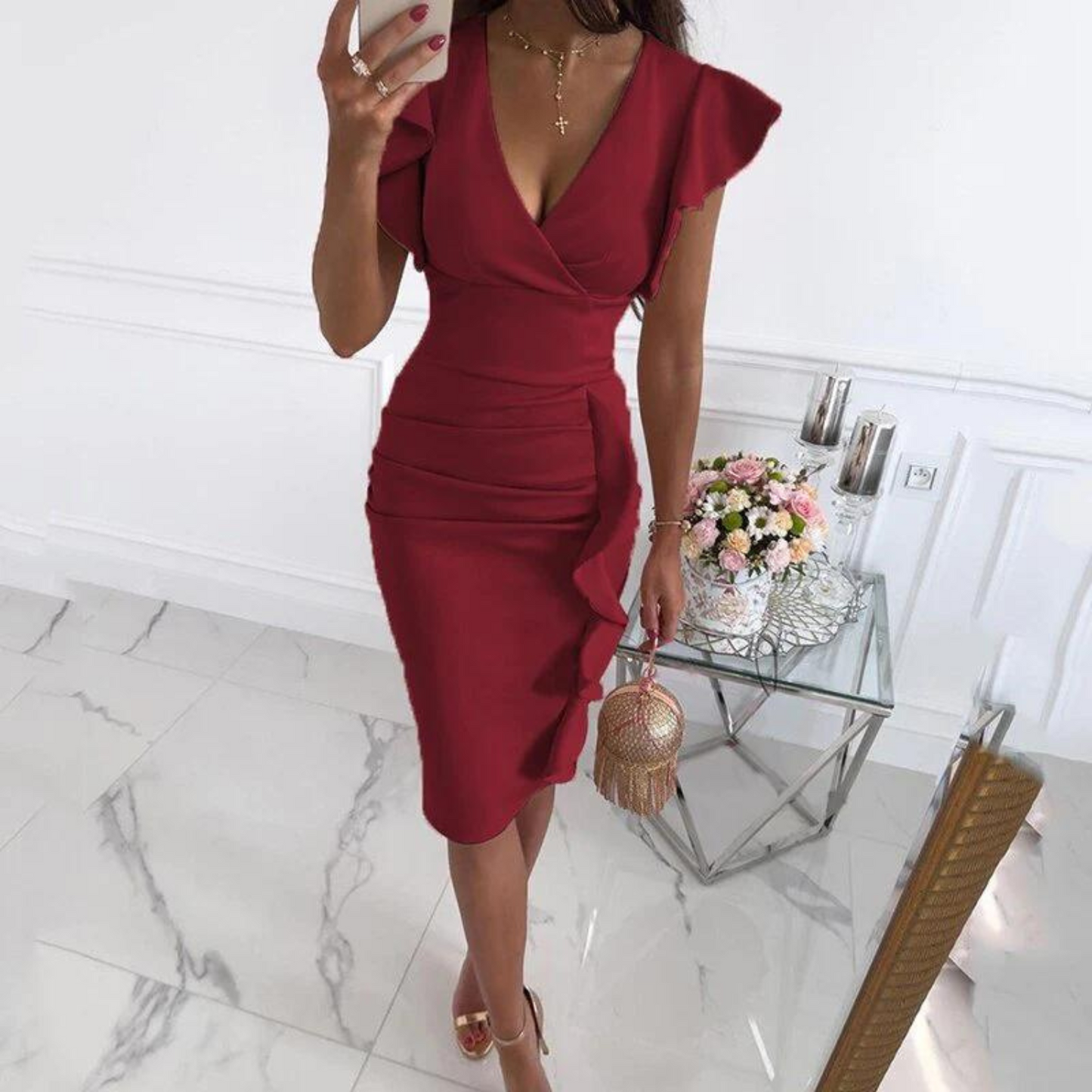 Detail of the hemline and stitching quality of the comfortable floral V-neck dress.