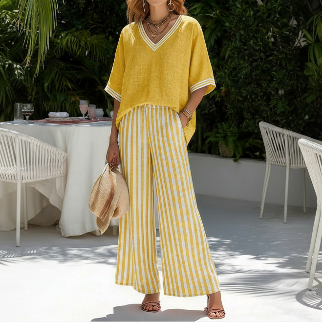 Back view of the Hadley striped linen set, highlighting the loose-fitting top and wide-leg pants.