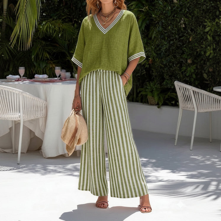 Woman sitting comfortably in the Hadley striped linen set, illustrating its suitability for laid-back days.