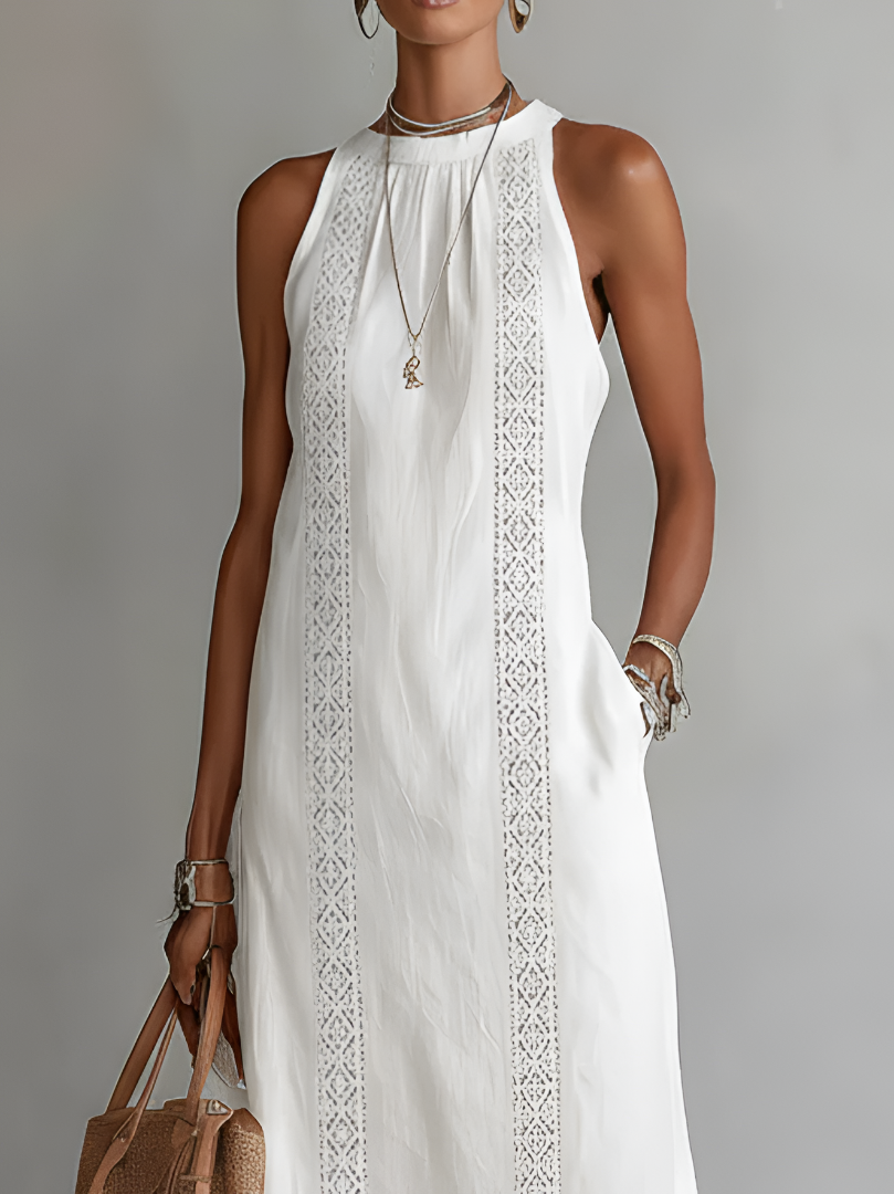 Close-up detail of the Mao collar and neckline of the stylish yellow Marlowe linen midi dress on a mannequin.
