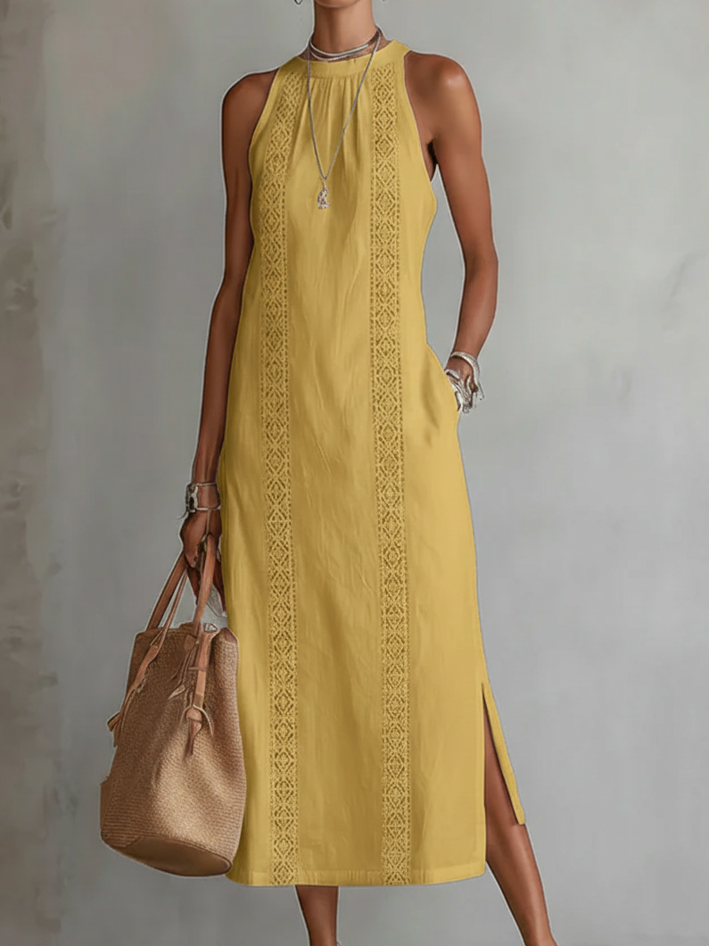 Hands in the functional side pockets of a black Marlowe linen midi dress, emphasizing convenience and design.