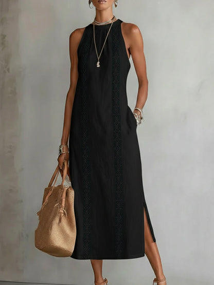 Full-length shot of a woman posing in a yellow Marlowe linen midi dress, capturing its effortless elegance.