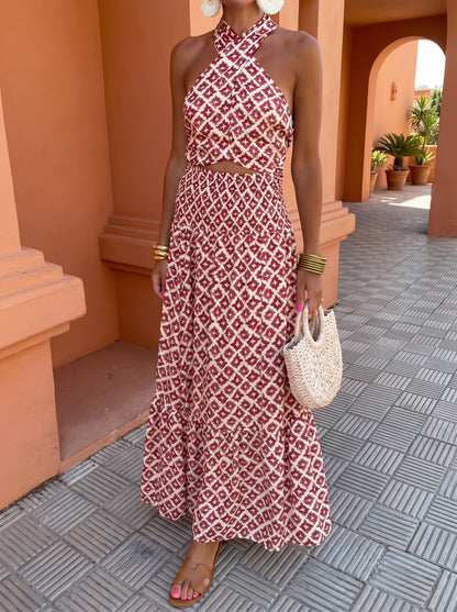 Back view of the elegant off-shoulder set, highlighting the design of the top and the movement of the skirt.