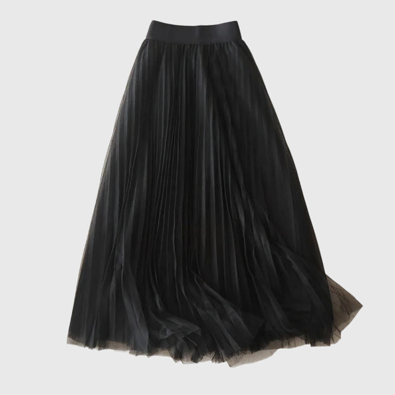 Close-up detail of the fabric and pleating on the Seraphina midi skirt, emphasizing its soft texture and quality craftsmanship.