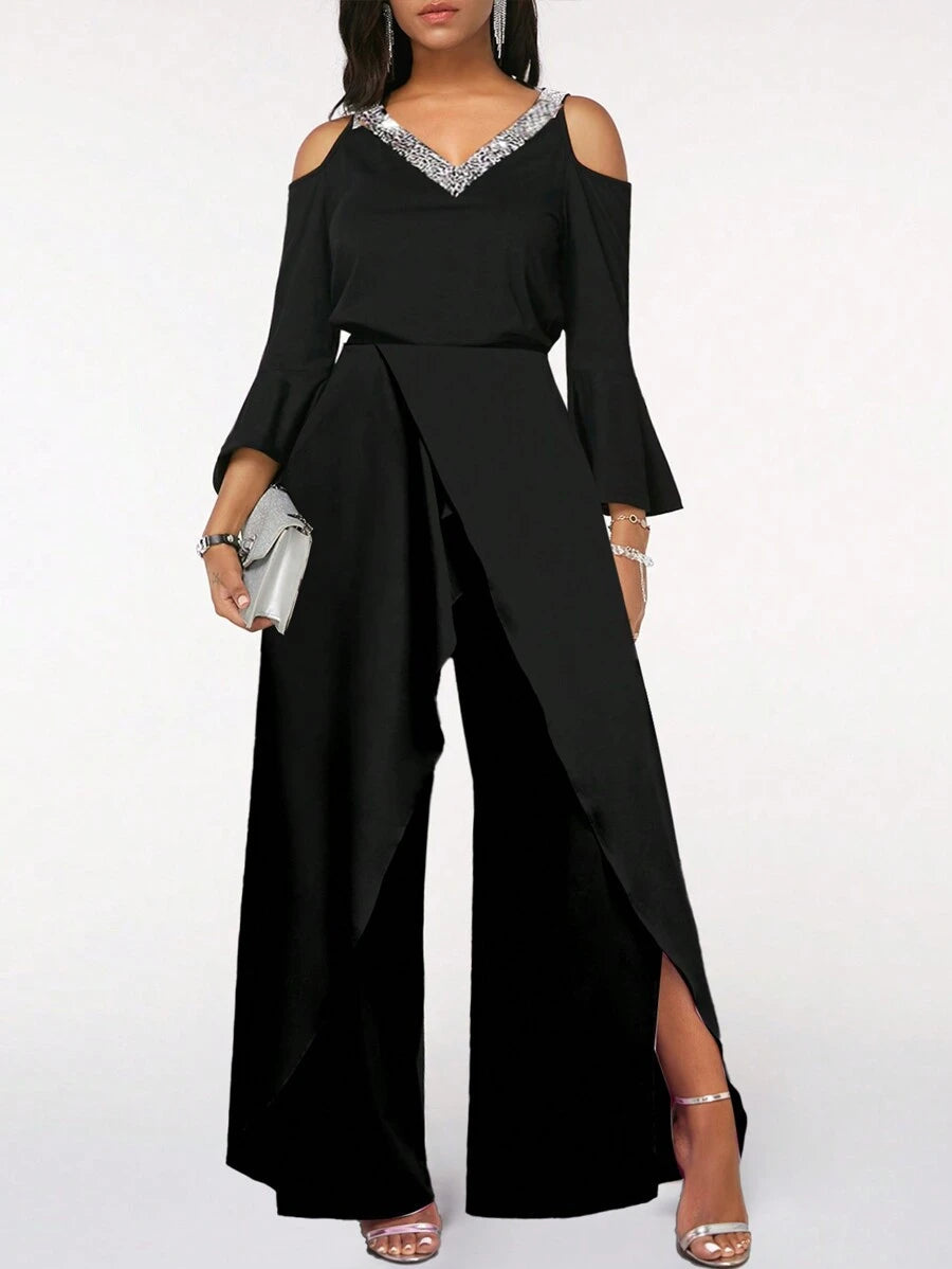 Close-up shot of the fabric and detail on the upper body of the Zarae elegant jumpsuit, highlighting its textured material.