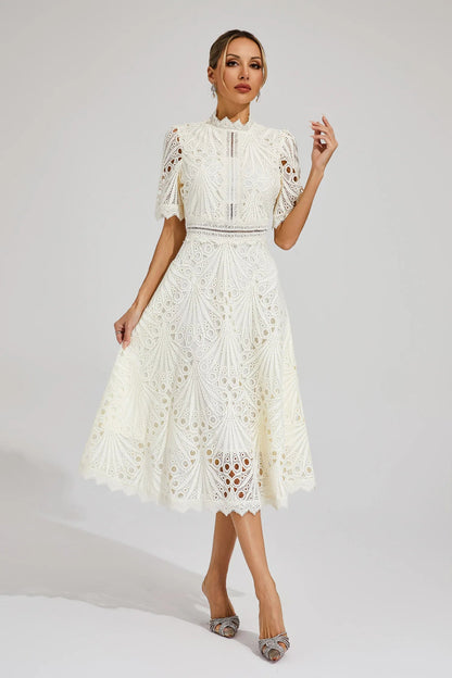Front view of the white Seraphina lace midi dress, showcasing its high neck and short sleeves.