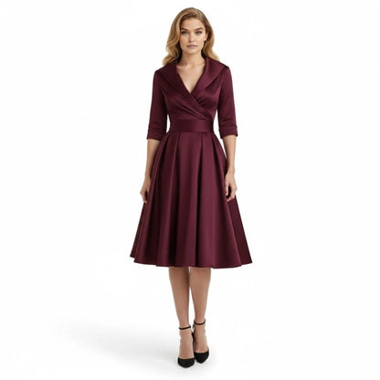 Close-up of the smooth, structured fabric of the Seraphina dress, showing its quality texture.