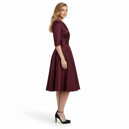 Front view of the Seraphina wrap midi dress in a deep brown, styled for a more casual daytime look.