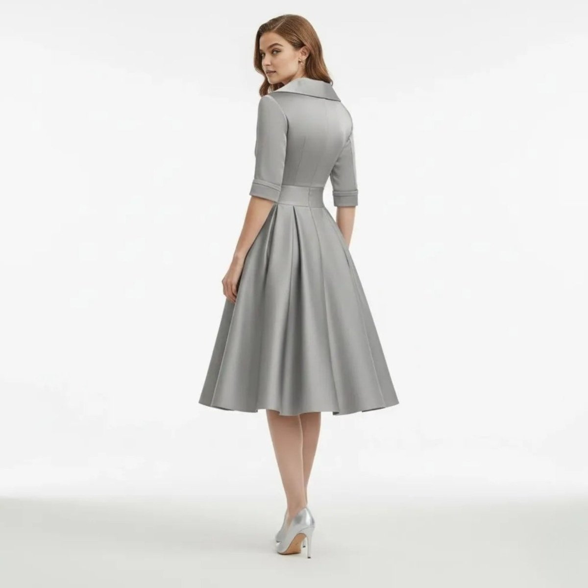 A woman laughing while wearing the cream Seraphina dress, depicting comfort and joyful elegance.
