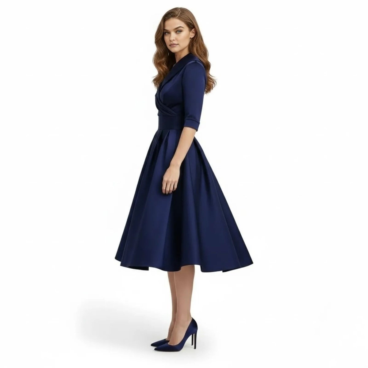 Side profile of a model wearing the elegant Seraphina dress in classic black, highlighting the midi length.