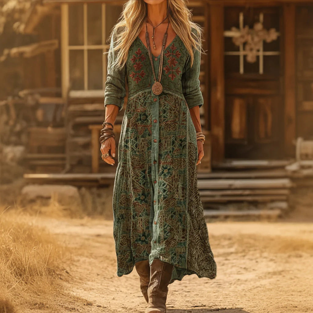 Side profile of a model wearing the Seraphina vintage bohemian maxi dress, highlighting its graceful movement.