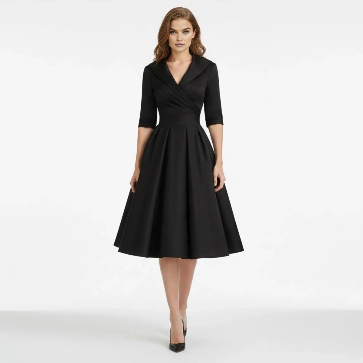 Back view of the Seraphina dress in a rich burgundy, showing the flowing A-line skirt in motion.