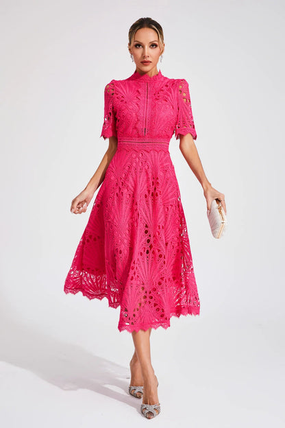 Close-up of the scalloped hem detail on the elegant lace midi dress, adding a handcrafted touch.