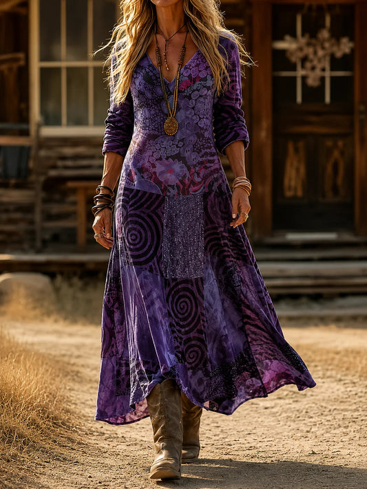 Lifestyle shot of the Seraphina dress in a terracotta hue, worn in an outdoor autumn setting.