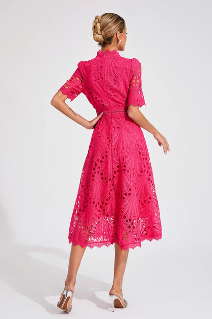 Back view of the white Seraphina lace midi dress, displaying the elegant silhouette.