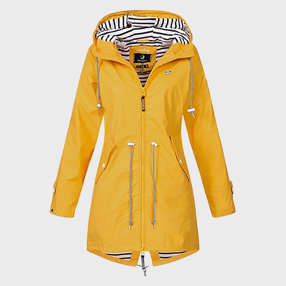 Close-up of the adjustable hood on a navy blue fashionable waterproof jacket, highlighting material texture.