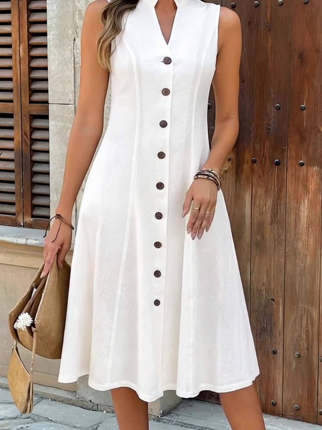 Close-up of the hemline and fabric movement of the flowy maxi dress, indicating its lightweight nature.