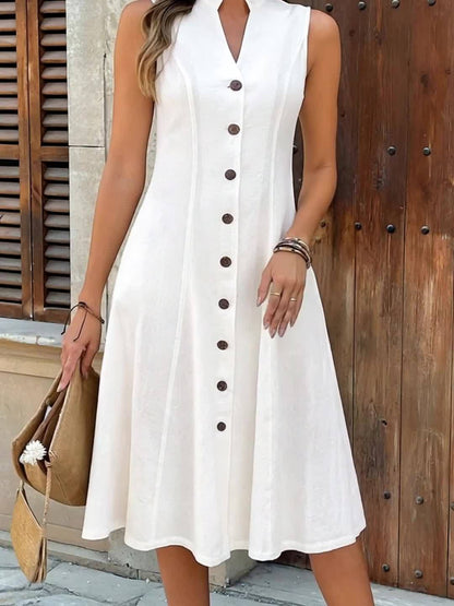 Close-up of the hemline and fabric movement of the flowy maxi dress, indicating its lightweight nature.