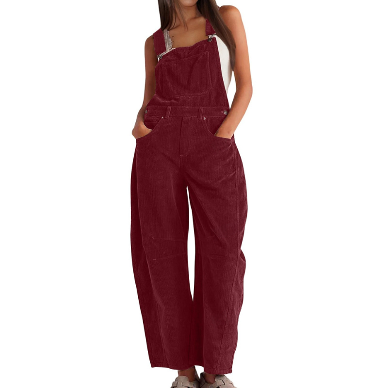 Close-up of the square neckline and practical side pocket on the stylish Soraya overalls.