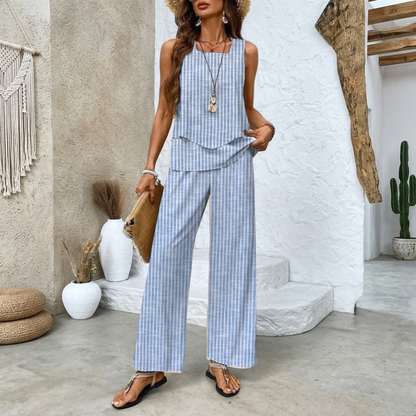 Detail shot of the top's layered design and the round neckline of the elegant summer set.