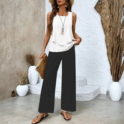 Overhead view of the red elegant summer set laid flat, showcasing the full design of the top and pants.