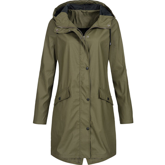 Front view of a vibrant dark green waterproof jacket on a model, showcasing its flattering fit and style.