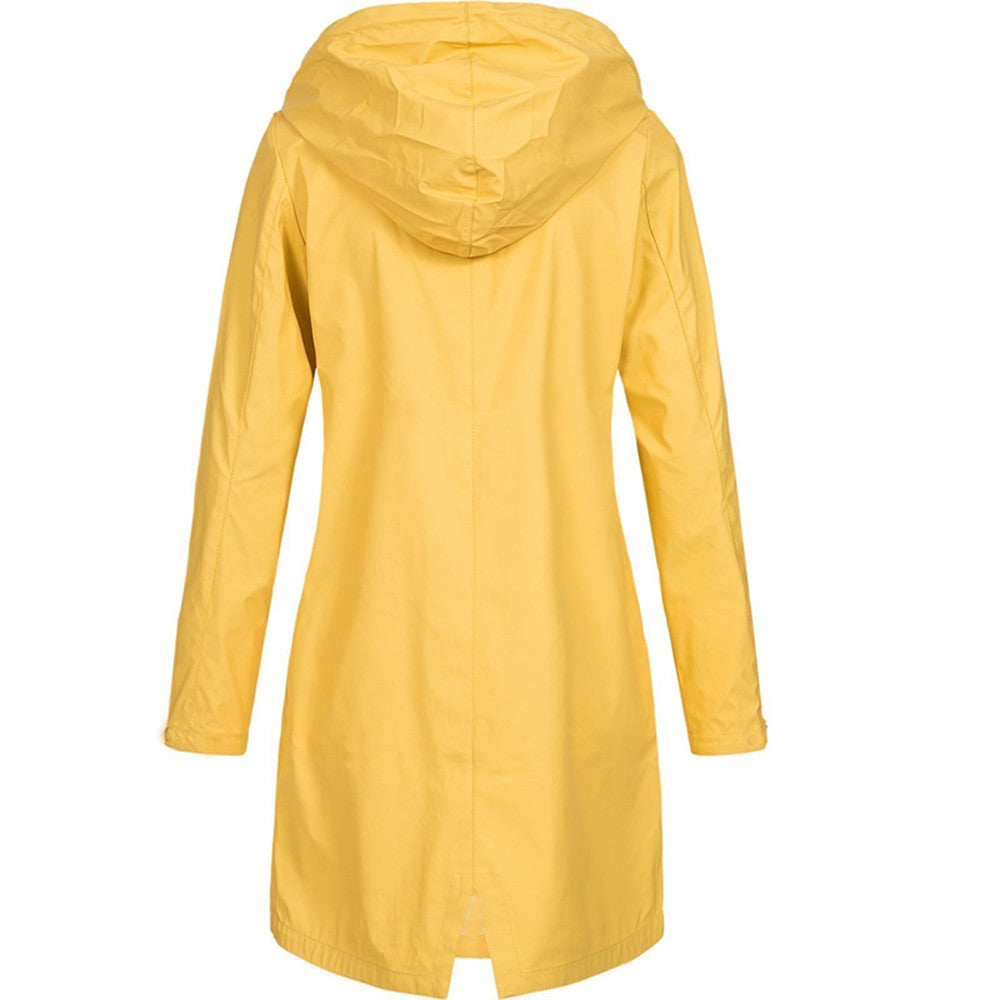 Back view of a black chic waterproof jacket, emphasizing the feminine silhouette and sleek design.
