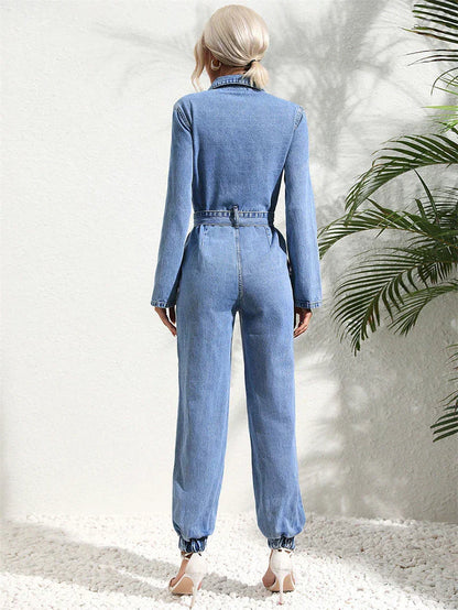 Detailed shot of the collar and chest pockets on the comfortable denim jumpsuit.