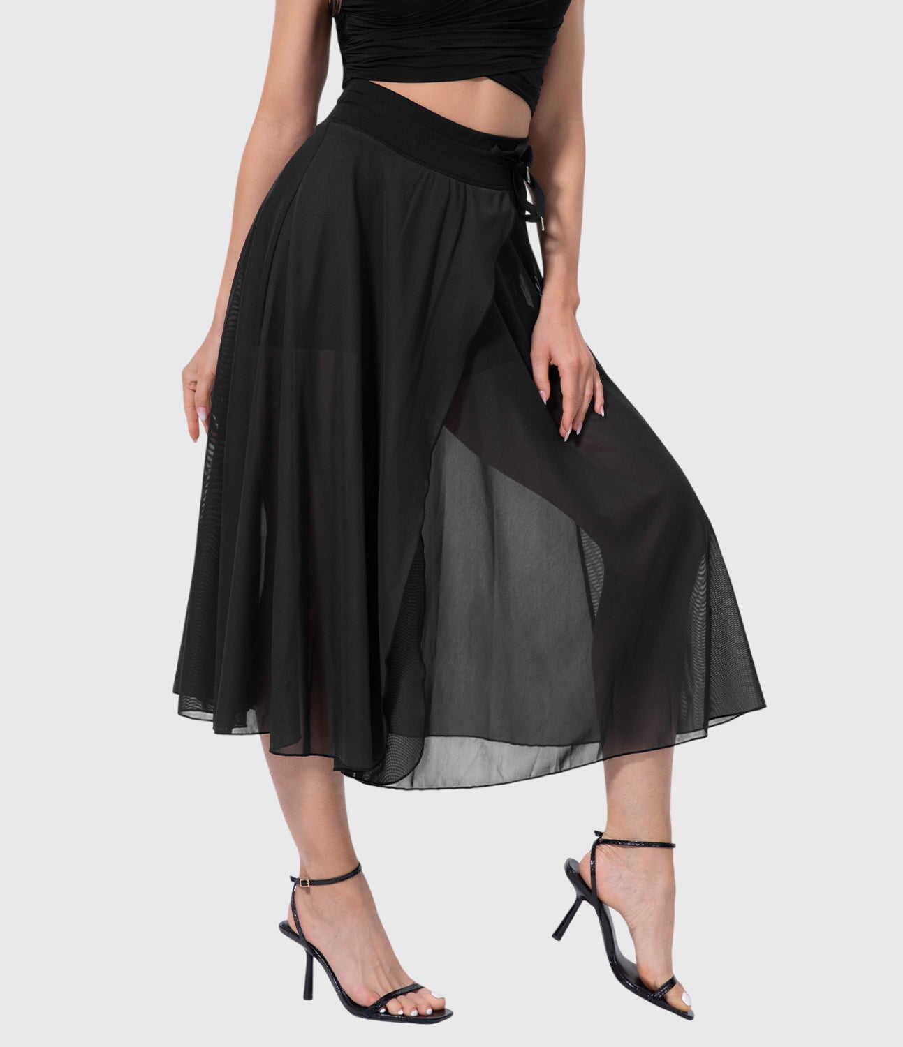 Close-up of the fabric texture on the black transformable fluid skirt, showing its soft touch and premium feel.