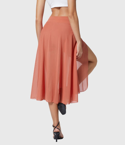 Model walking away in the blue transformable fluid skirt, highlighting its natural flow and elegant movement.