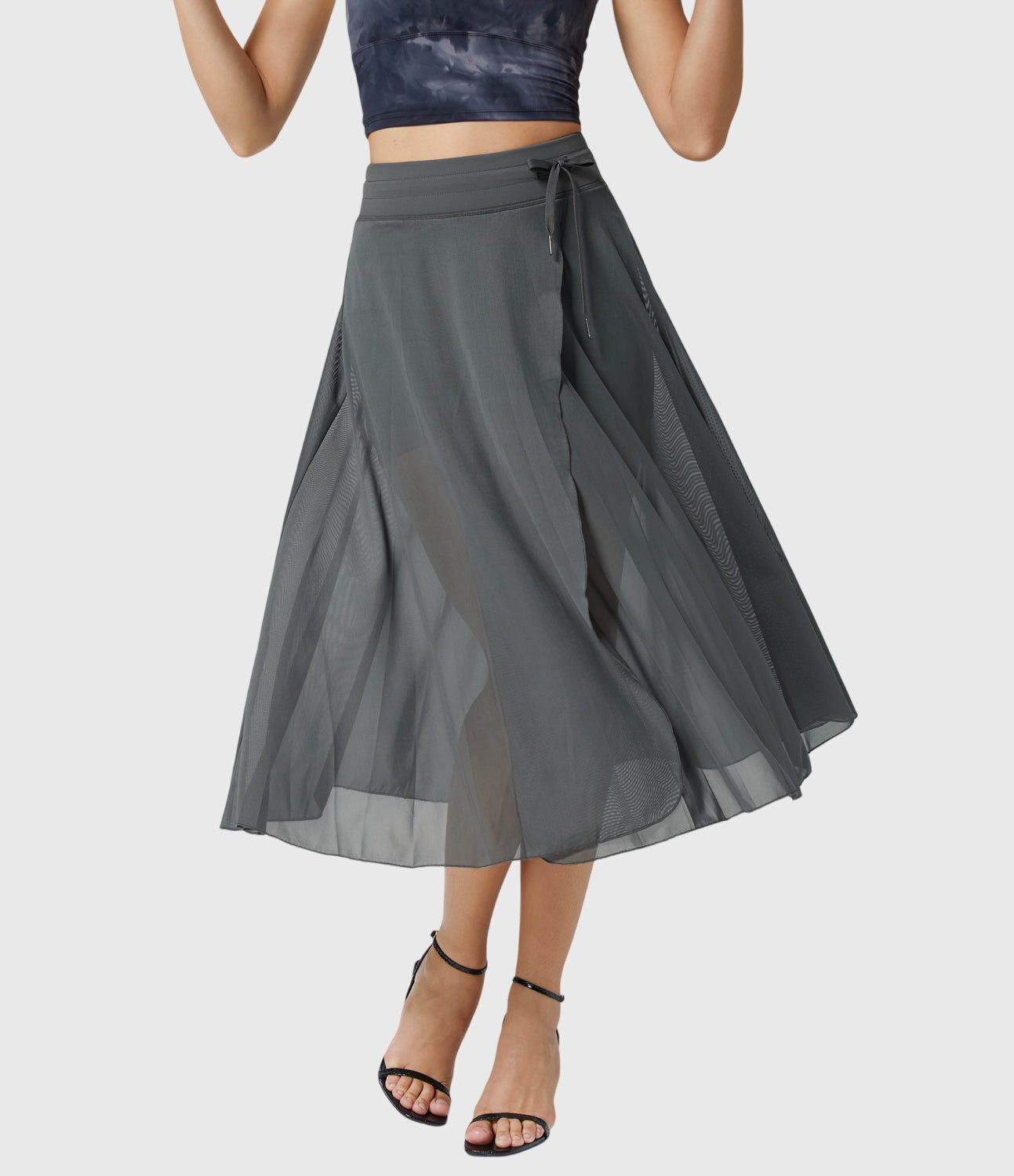 The coffee transformable fluid skirt in a studio setting, emphasizing its sophisticated color and versatile appeal.