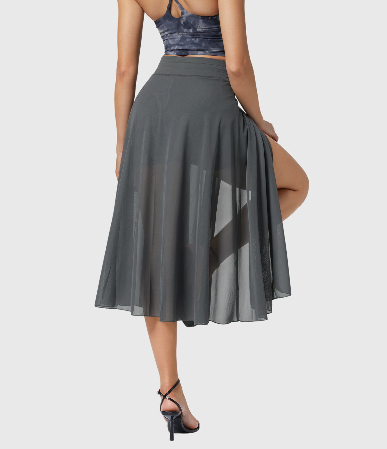 Front view of the turquoise transformable fluid skirt, showcasing its adaptability for various body types.