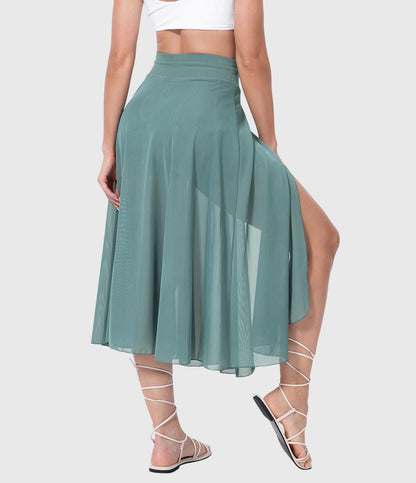 Back view of the black transformable fluid skirt, showing the graceful movement and comfortable high-waist fit.