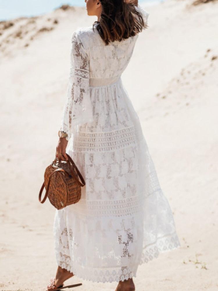 A close-up of the hemline and movement of the Seraphina elegant flowy dress, emphasizing its graceful flow.