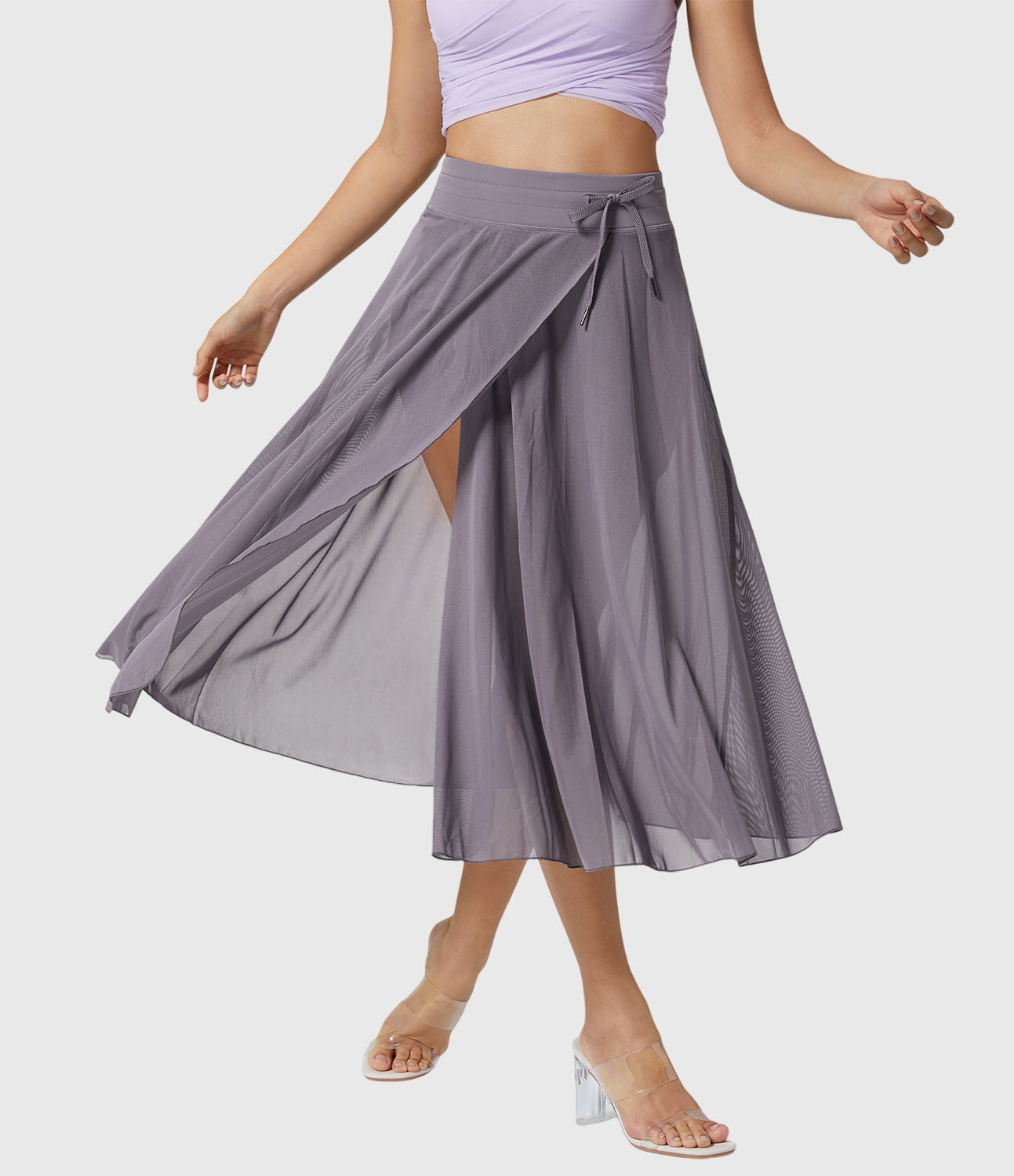 The coffee-colored transformable fluid skirt styled with a casual top, suitable for everyday wear and comfort.