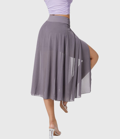 Overhead view of the turquoise transformable fluid skirt laid flat, revealing its unique construction and built-in shorts.