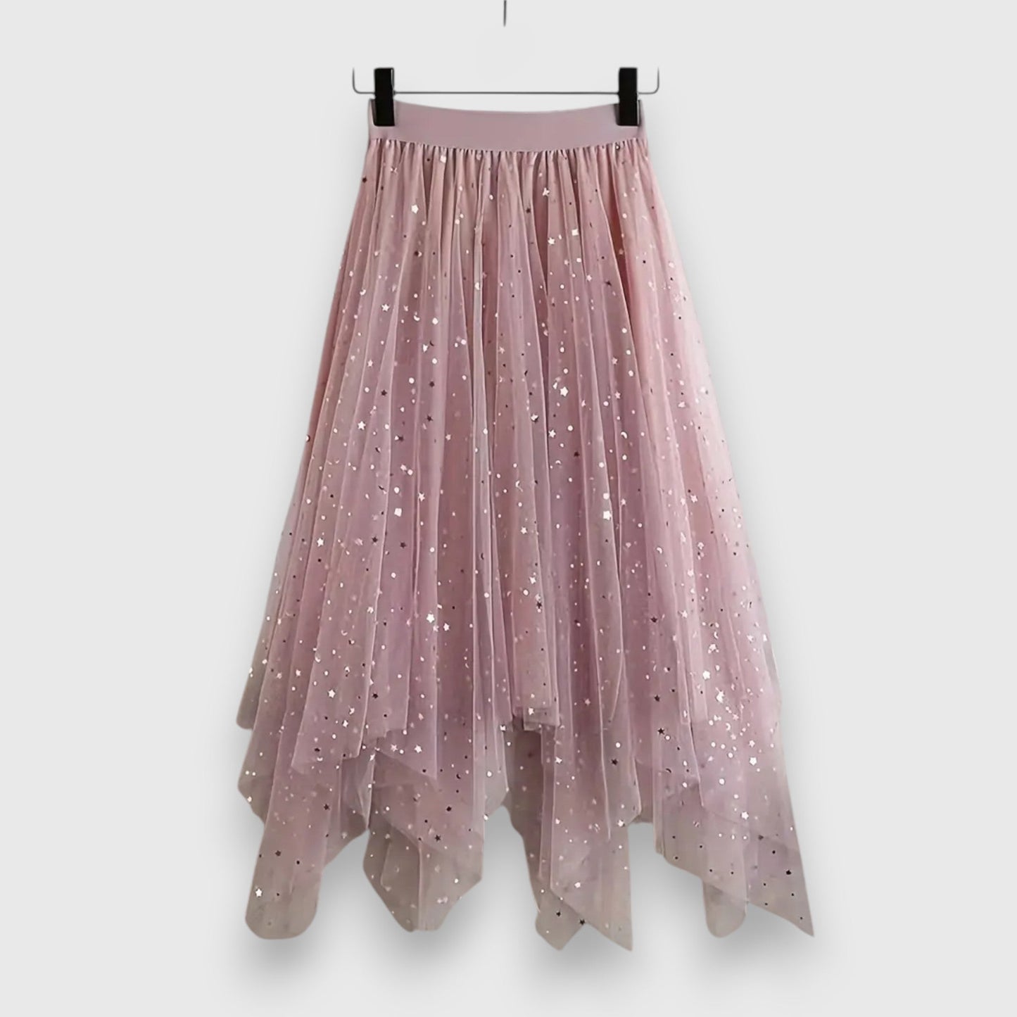 Front view of the Valentina shimmering tulle midi skirt in a soft pink, showcasing its flowing silhouette and delicate sparkle.