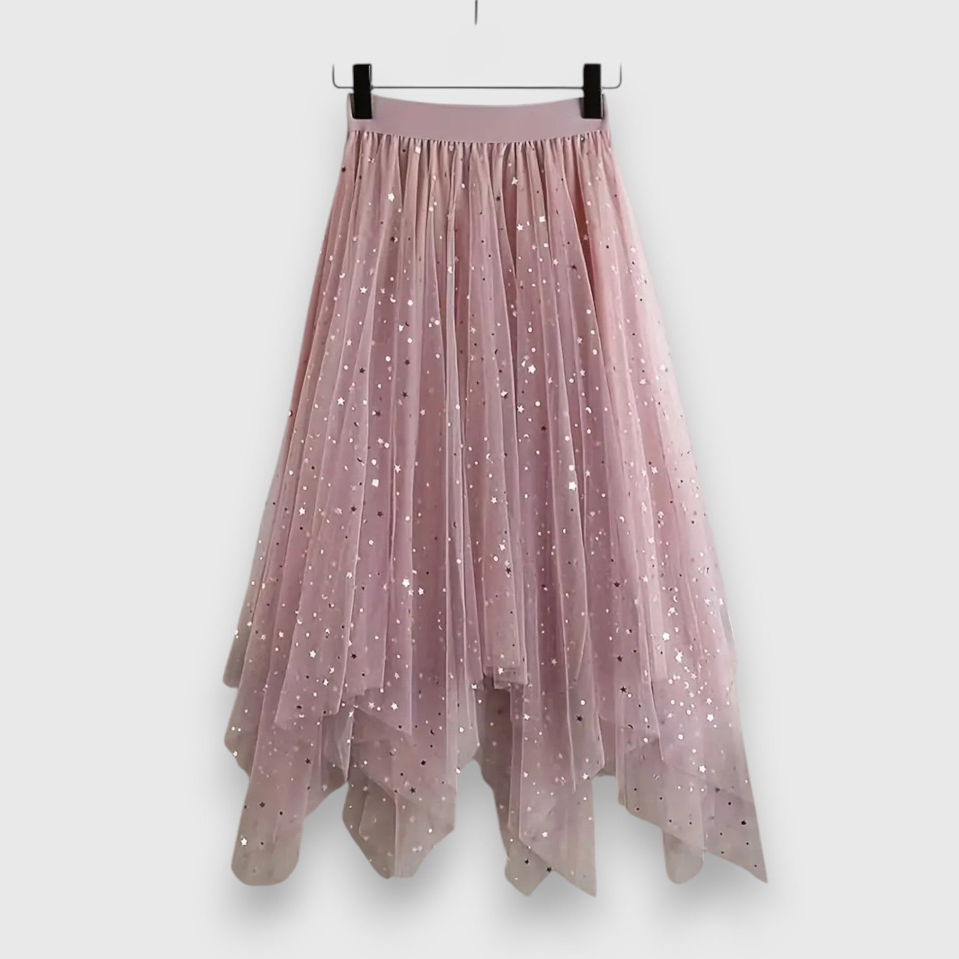 Front view of the Valentina shimmering tulle midi skirt in a soft pink, showcasing its flowing silhouette and delicate sparkle.