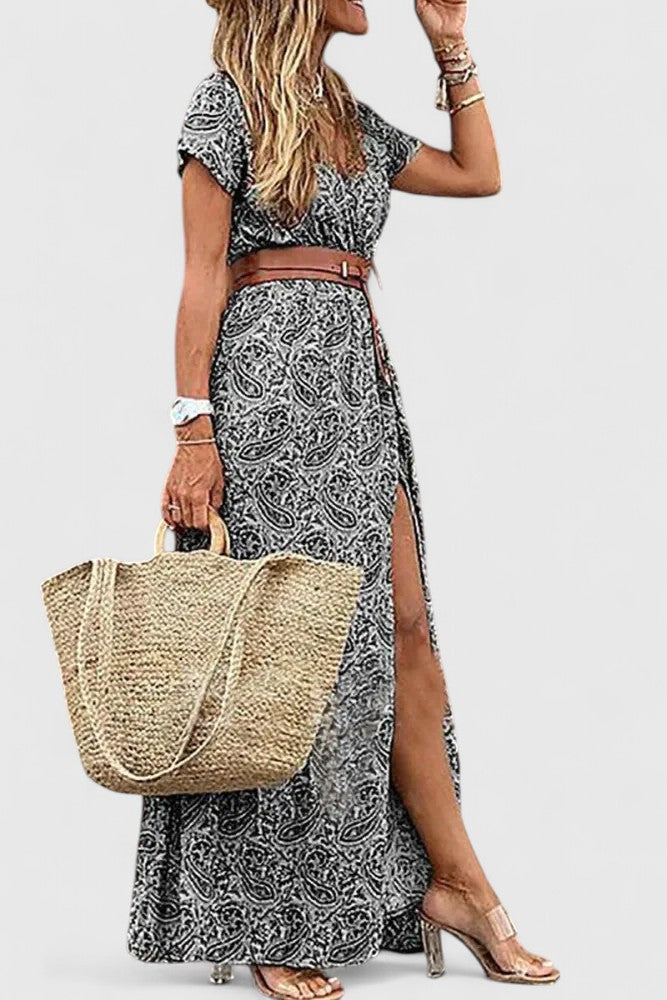 Full-length view of a woman confidently walking in a brown elegant A-line dress, demonstrating its versatile appeal.