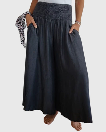 Flat lay of the grey Seraphina maxi skirt, displaying the full length and soft material on a neutral background.
