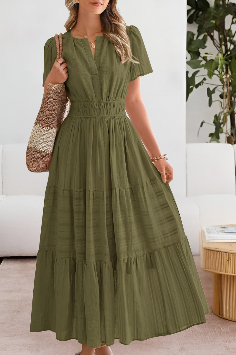 Model posing in the Yara summer dress in crisp white, demonstrating its versatility.